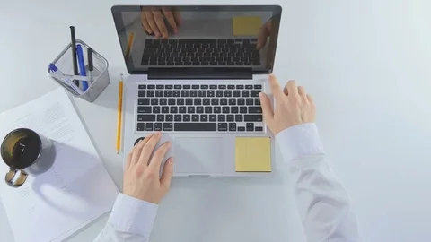 Office worker tries to turn on the computer Video stock 81475287