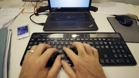 Office worker typing on computer keyboard Stock Footage 113825148