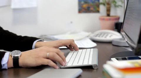 Office Worker Typing on the Keyboard Stock Footage 47977689
