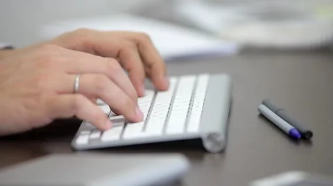 Office Worker Typing on the Keyboard Video stock 47977708