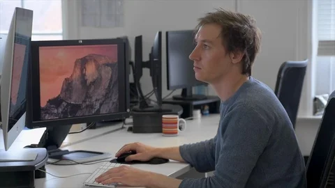 Office Worker Typing on Keyboard Wide Shot Stock Footage 87500485