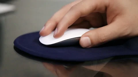 An office worker using an Apple Magic Mouse, close up Stock Footage 39375576