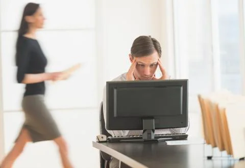 Office worker using computer Stock Photos