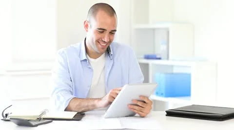 Office worker using electronic tablet Video stock 14832841