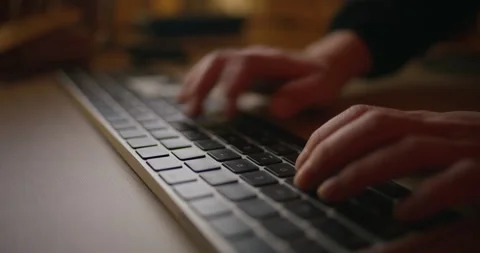 Office worker using laptop during busy workday Stock Footage 305044414