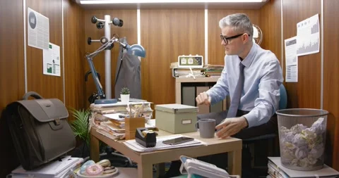 Office worker using objects as drums Stock Footage 309020559