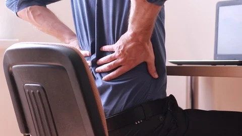 Office worker warming his back 動画素材 92298235