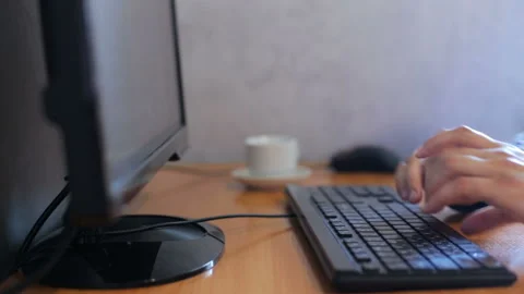 An office worker works at a computer Stock Footage 92430643