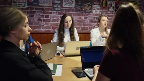 Office workers brainstorm ideas on new project in office Stock Footage 276104627