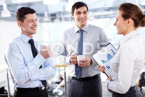 Office workers communication during the coffee break Stock Photos