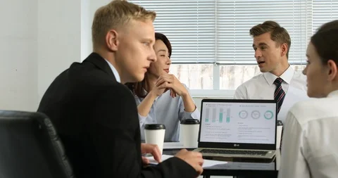 Office workers in compay meeting Stock Footage 100955969