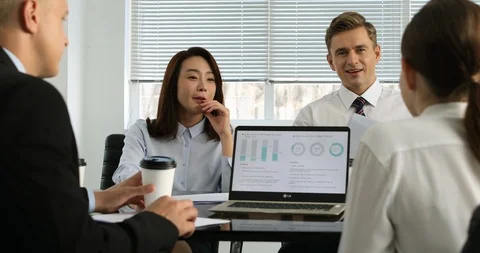 Office workers in compay meeting Stock Footage 100956004