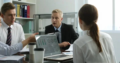 Office workers in compay meeting Stock Footage 100956179