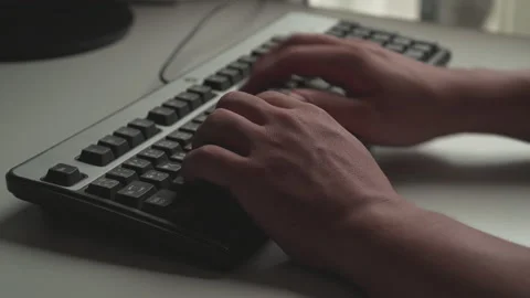 Office workers computer keyboard to send emails and browse web browsers. Stock Footage 187476381