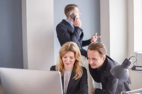 Office workers at computer in modern office Foto stock