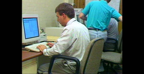 OFFICE WORKERS AT COMPUTERS (1991) Stock Footage 240077210