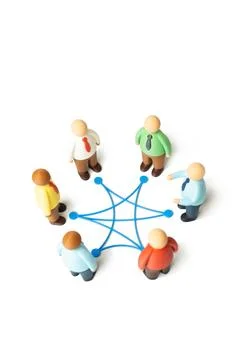 Office workers connected through work relationships and business processes. T Stock Photos
