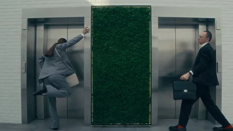 Office Workers Dancing by Elevators in Business Centre Stock Footage 285829591