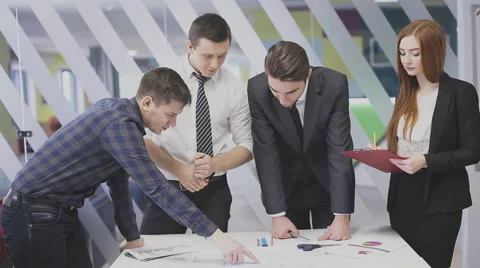 Office workers discussing a project. Stock Footage 59836533