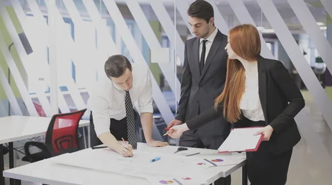 Office workers discussing a project Stock Footage 59854519