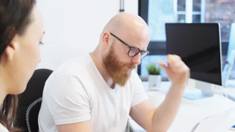 Office workers examining files Stock Footage 96498430