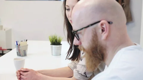 Office workers examining files Stock-Footage 96501560