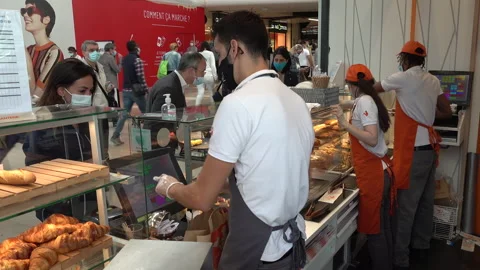 Office workers with face masks buy lunch, Covid-19 coronavirus Paris France Stock Footage 139744764