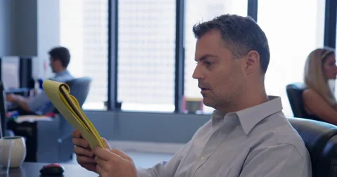 Office workers hand on unwanted project to their colleagues 4K Stock Footage 67545396