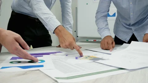Office workers hands in close-up, actively discuss a project, come to an Stock Footage 137722550