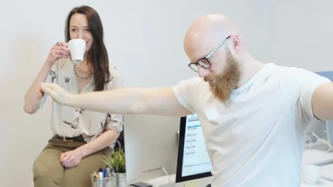 Office workers having fun Stock-Footage 96509672