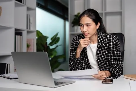 Office Workers Leaving Work Late in a Modern Corporate Environment with Busy Stock Photos