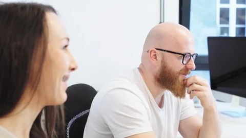 Office workers talking and laughing Stock Footage 96497632