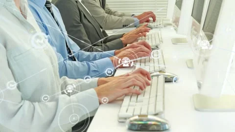 Office workers typing at desks creating animated network linking keyboards for Stock Footage 331872427