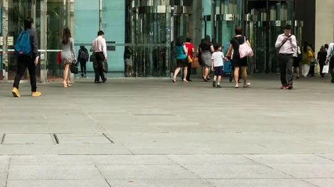Office workers walk to work in financial and business district Singapore. Stock Footage 81160306