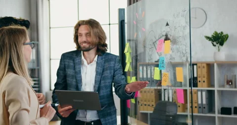 Office workflow concept of attractive smiling successful experienced coworkers Stock Footage 157986034