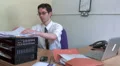 Office working looking through papers HD Footage
