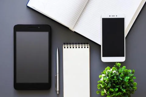 Office working table top view with planner and gadgets Foto stock