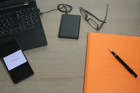 Office Workspace with Document Folder and Data Stock Photos