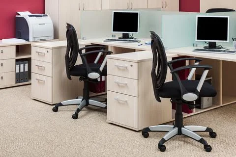 Office workstations with computers Stock Photos