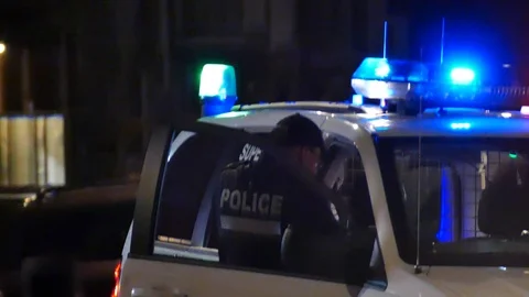 Officer chatting at command post Stock Footage 116708583