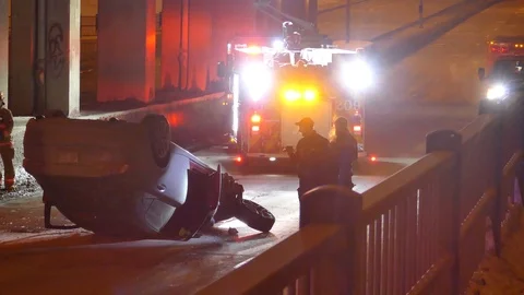 Officer with flashlight on car accident Stock Footage 103868582