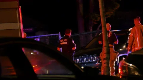 Officer lighting car bumper Stock Footage 116712295