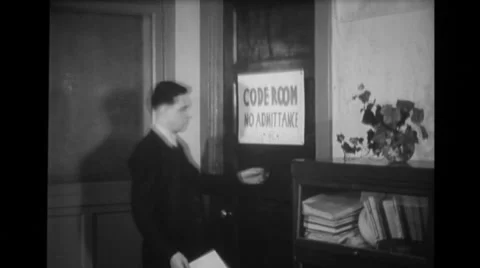 Officer passing document to code room Stock Footage 37595247