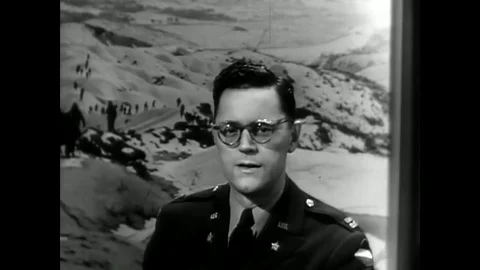 Officer Sam Putterbaugh explicates on the differences between fighting in WWII Stock Footage 82426335