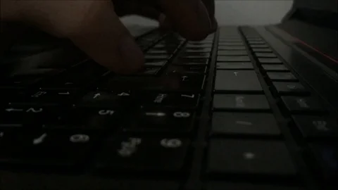 OFFICER TYPES ON KEYBOARD Stock Footage