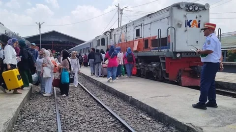 An officer in uniform monitors passengers Video stock 337402887