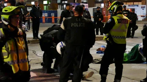 Officers arresting protesters Stock Footage 120094666