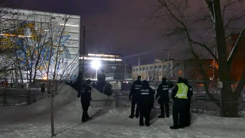 Officers during winter dealing with protesters Stock Footage 139664106
