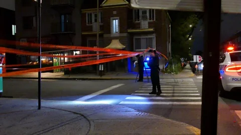 Officers with flashlight at crime scene Stock Footage 116598006