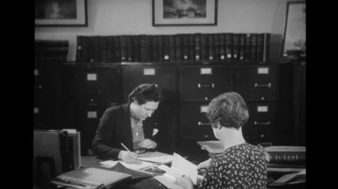 Officers working in the record room Stock Footage 37595166